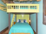 The tiki suite has a queen/double bunk bed and en suite half bath 